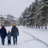 A serene winter landscape with a snowy urban - dailyglowandgrow Family of three walking through snowy winter landscape